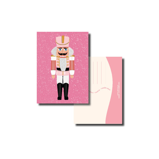 Kerstkaart A6 – Roze Notenkraker met Sneeuw – Envelop Optioneel